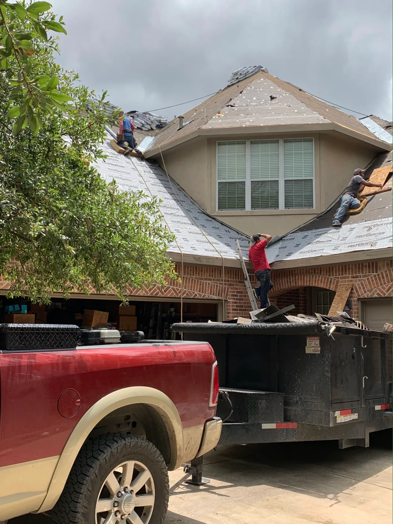 Roofing crew working on a residential project